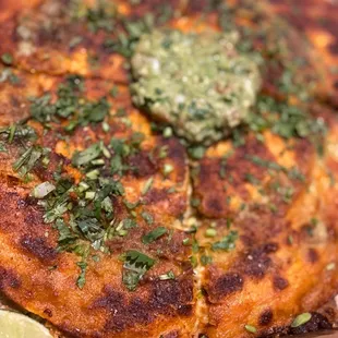 pizzadilla topped with guacamole