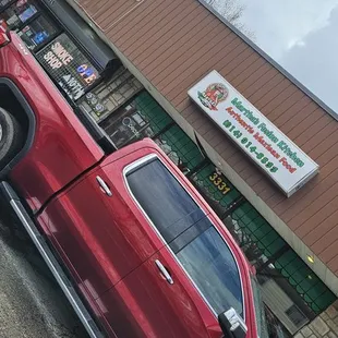 Front sign. Located next to corner store and the restaurant and corner store share a private parking lot