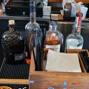 a bar with bottles of liquor
