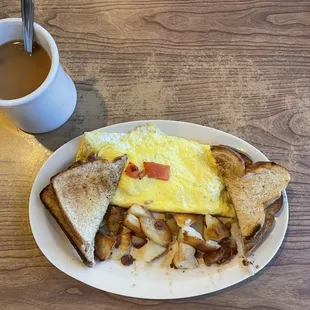 Three egged Omelet with sausage, tomato, and cheese! With a side of grilled home fries and wheat toast