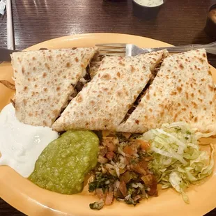 Steak, chicken quesadilla add onions and peppers