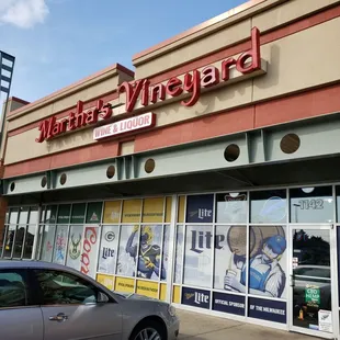 a car parked in front of the store