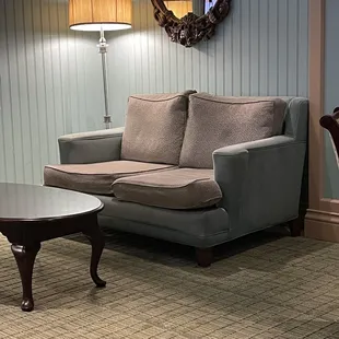 a living room with a couch and a coffee table