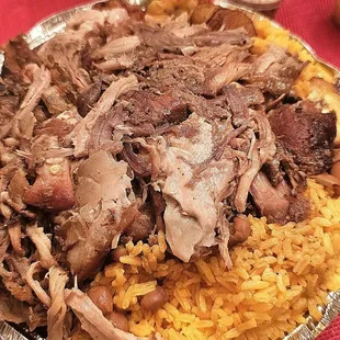 Pernil , rice , beans , sweet plantains.