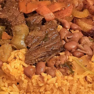 Beef stew , rice beans ,plantains.
