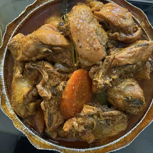 a bowl of chicken and carrots