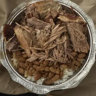 Pernil (roasted pork) - they have completely MASTERED this recipe for continuous volume. Rice &amp; Beans $16. on 1/8/24