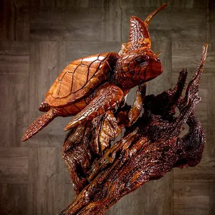Hand-carved Koa sculptures made by Hawaii craftsman Craig