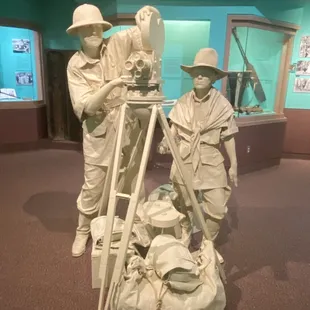 Life size statue of the Johnsons.