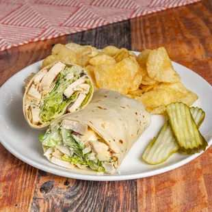 a chicken wrap and chips