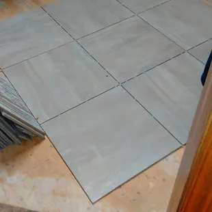 laying in tile for master closet