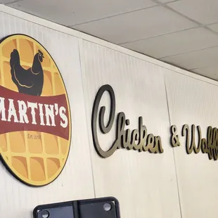 a chicken and waffle sign