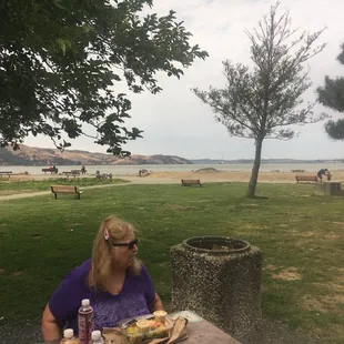 My beautiful mom enjoying lunch by the water