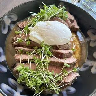 Bowl of the day:  rice, gravy, steak, poached egg and micro greens