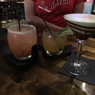 two cocktails on a table