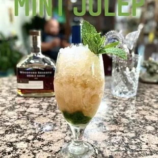 Made with bourbon, mint simple syrup, and mint
