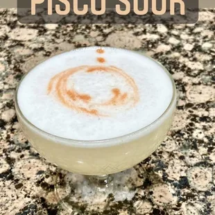 Made with pisco, lime juice, gum syrup, and egg white