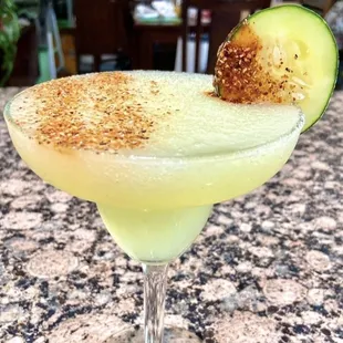 Made with tequila, triple sec, cucumber, jalapeño simple syrup, and lime juice