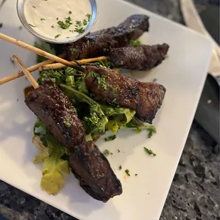 Grilled steak skewers with horseradish sauce