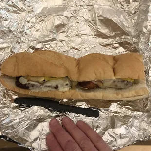 1/2 of a Fuggetaboutit sub.  Half.  Fried chicken, sautéed onions and banana peppers, provolone