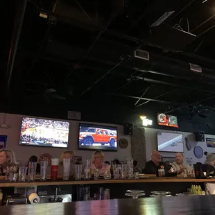 people sitting at the bar
