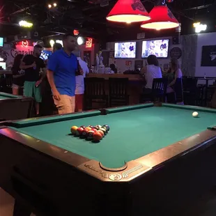 Pool tables and horseshoe bar