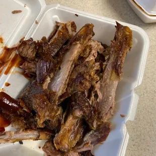 1 lb of overcooked, dry ribs. Mostly bone