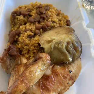 Chicken, yellow rice with beans, malanga (sweet potato)