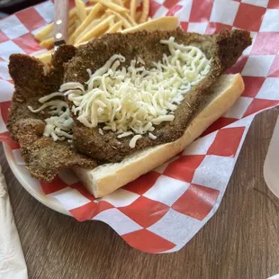 Breaded steak sandwich with Marianna sauce on side (originally served on sandwich directly) Breaded Steak Sandwich