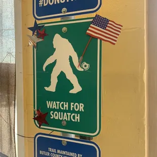a sign with a bigfoot