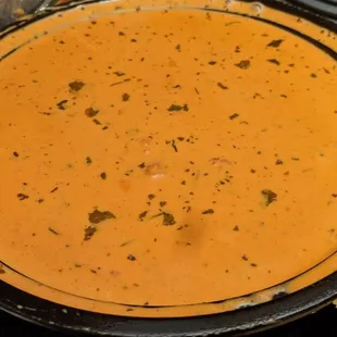a bowl of soup on the stove