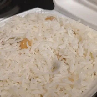 rice and nuts in a styrofoam container