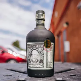 a closeup of a bottle on a table