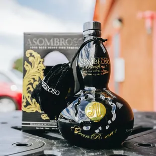 a bottle and a book on a table