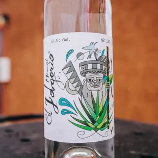 a bottle of wine on a table