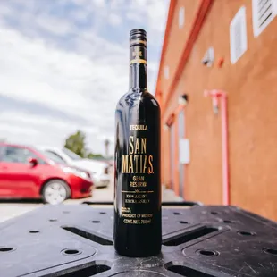 a bottle of wine sitting on a table