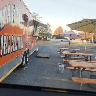 a food truck parked in a parking lot