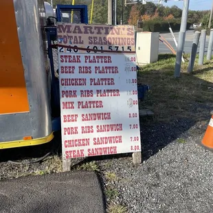 a sign on the side of the road