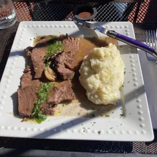 Roast beef in wine/herb sauce is todays special.
