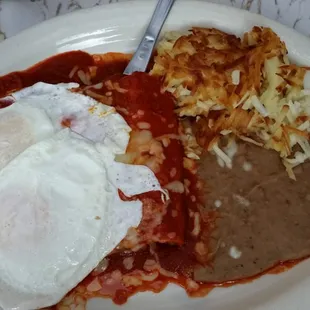 The enchilada breakfast, eggs over medium