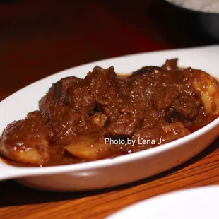 Shamday ($18.25) - traditional Tibetan recipe, boneless braised beef with potatoes in mild curry