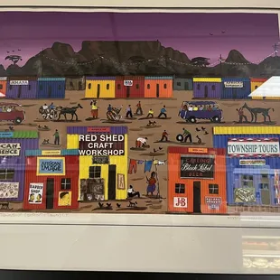 I noticed this artwork in here today as I was waiting on my breakfast sandwich. It's called "African Township". I'm surprised but I love it!