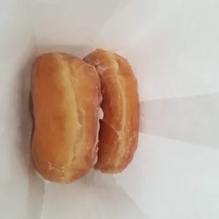 2 glazed raised donuts to go