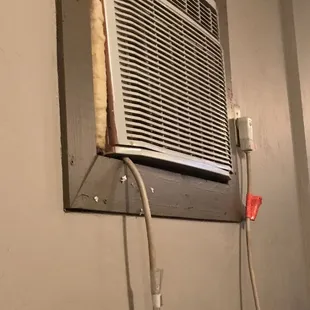 The decor at our table... notice the spit balls under the air conditioner.