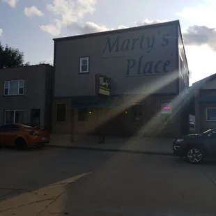 a car parked in front of a building