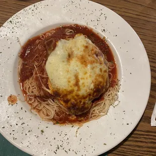 Spaghetti with hot sausage stuffed pepper
