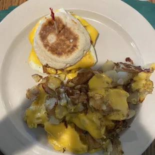 Breakfast sandwich with bacon and cheese potoatos