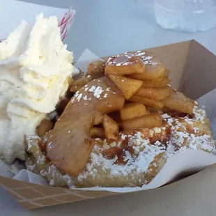 Baked apples, sea salt caramel and maple bourbon whipped cream...there is also a waffle under there.