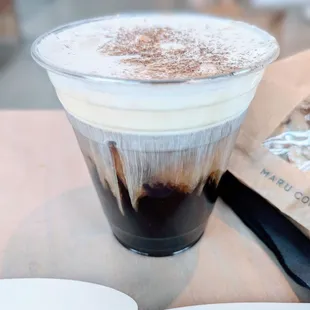 Cream top. Long black iced.