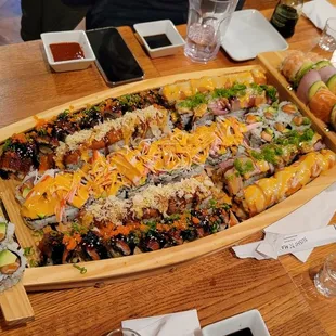 Sushi boat with tons of rolls